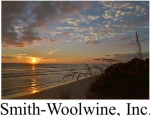 Sunset photo with caption of Smith-Woolwine, Inc.